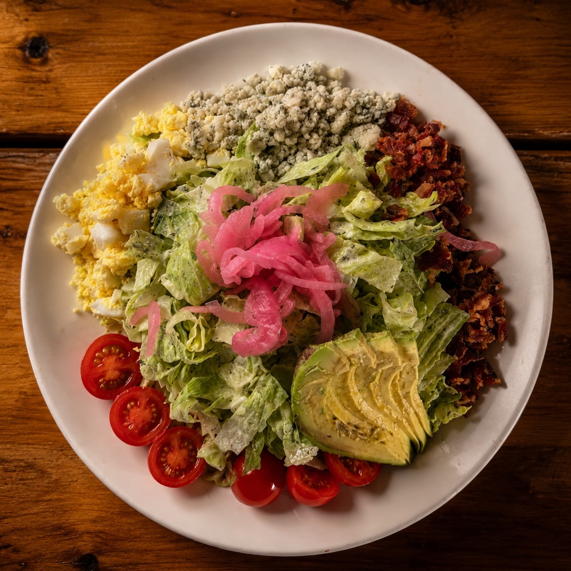 Aster chopped salad with romaine, avocado, blue cheese, bacon and eggs