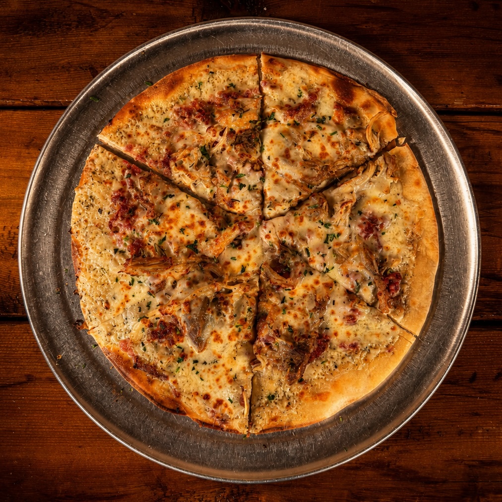 Chicken bacon ranch flatbread with fontina, mozzarella, braised chicken and bacon